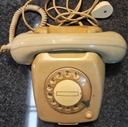 Telephone with dial